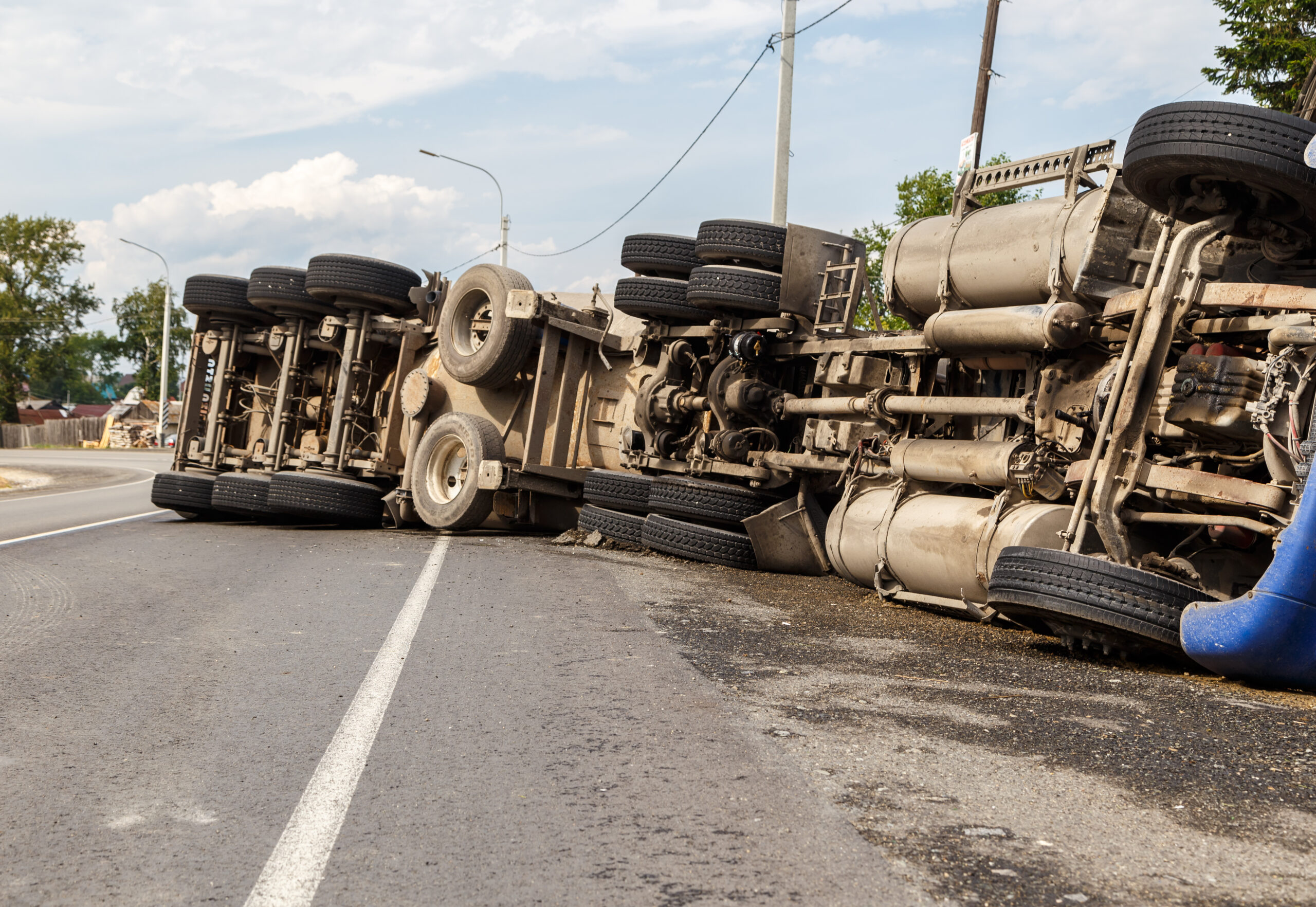 A view of an overturned truck on an highway in an accident.