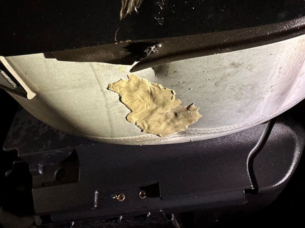 Patching damaged fuel tank in fuel spill cleanup, Federal Way, WA