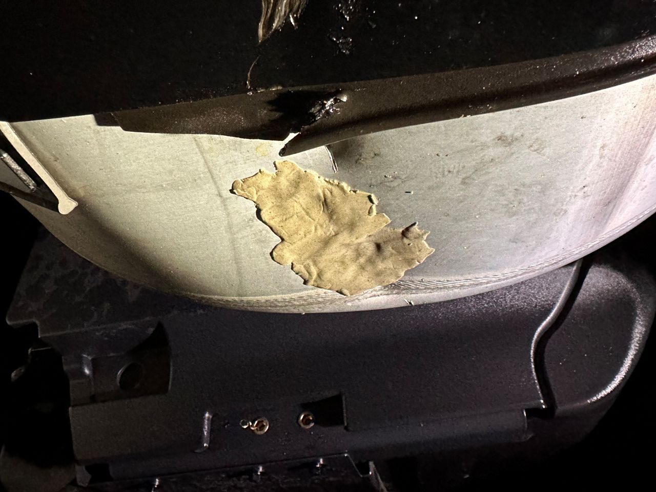 Patching damaged fuel tank in fuel spill cleanup, Federal Way, WA